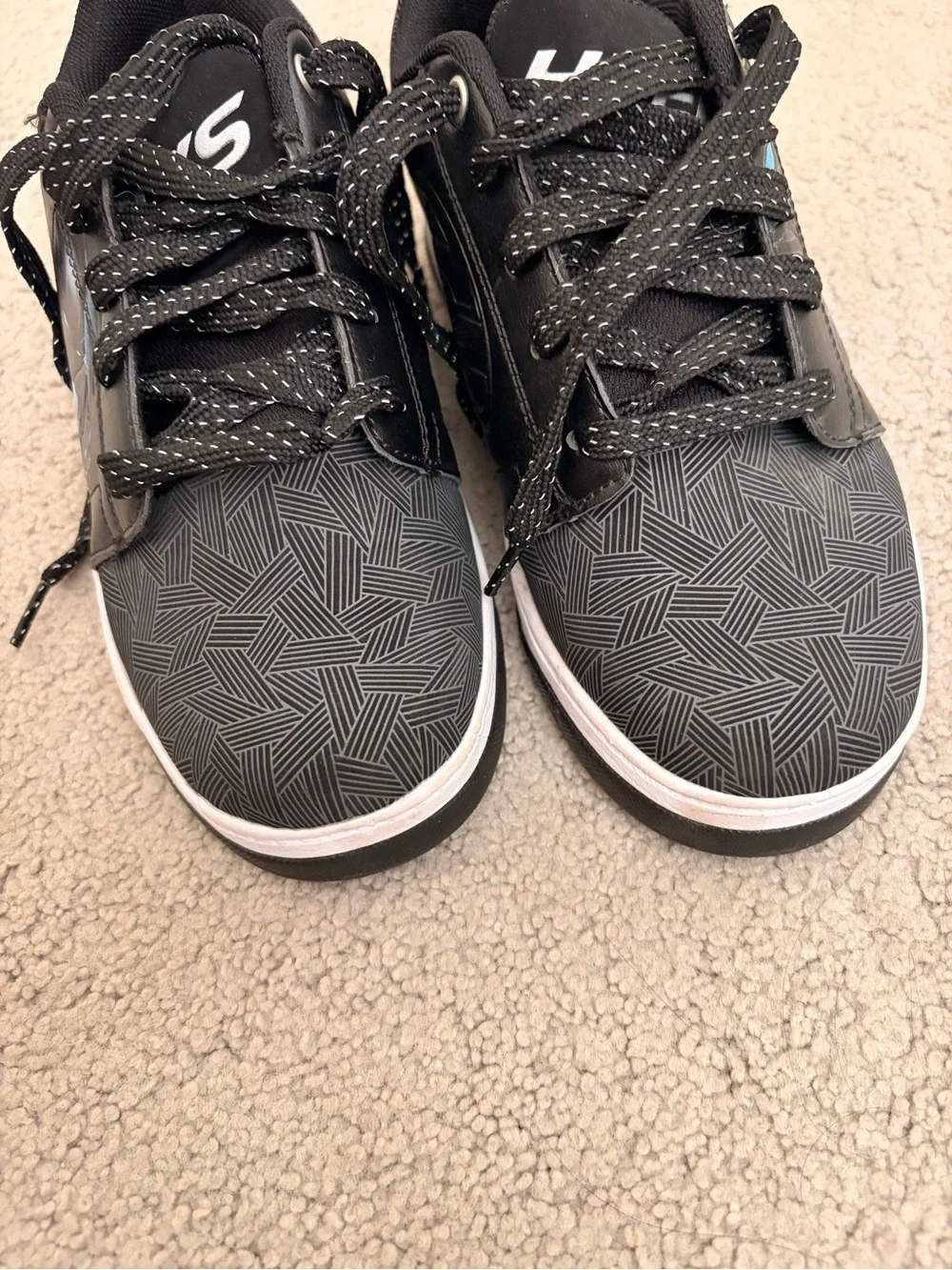 Heelys Black and White Kids' Sneakers with Subtle Blue Accent